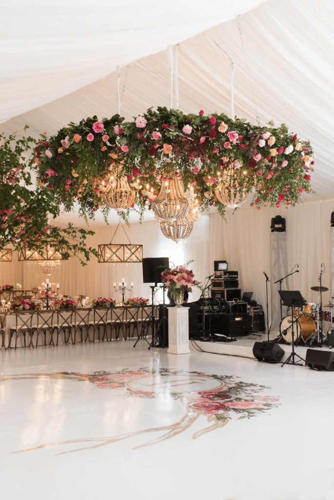 A WEDDING DECOR IN RING-A-RING-A ROSES AND CHANDELIERS  floral hanging
