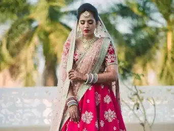 One over the head, the other corner to corner like a creased saree pallu 