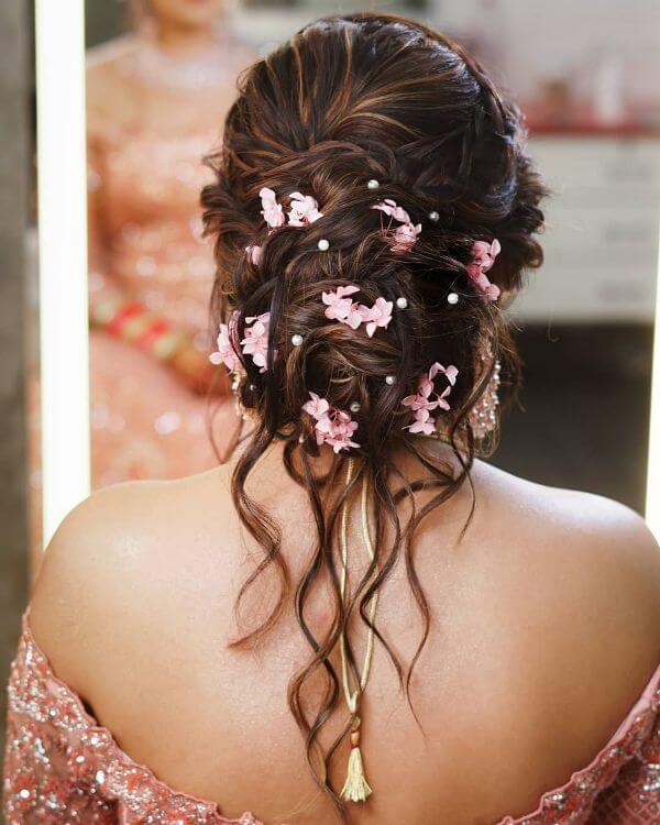 Stunning Bridal Bun Hairstyles For Your Wedding Functions 1
